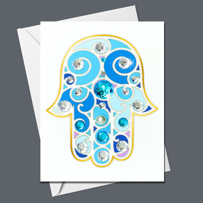 Blue and gold Hamsa greeting card with hand-applied sparkling details
