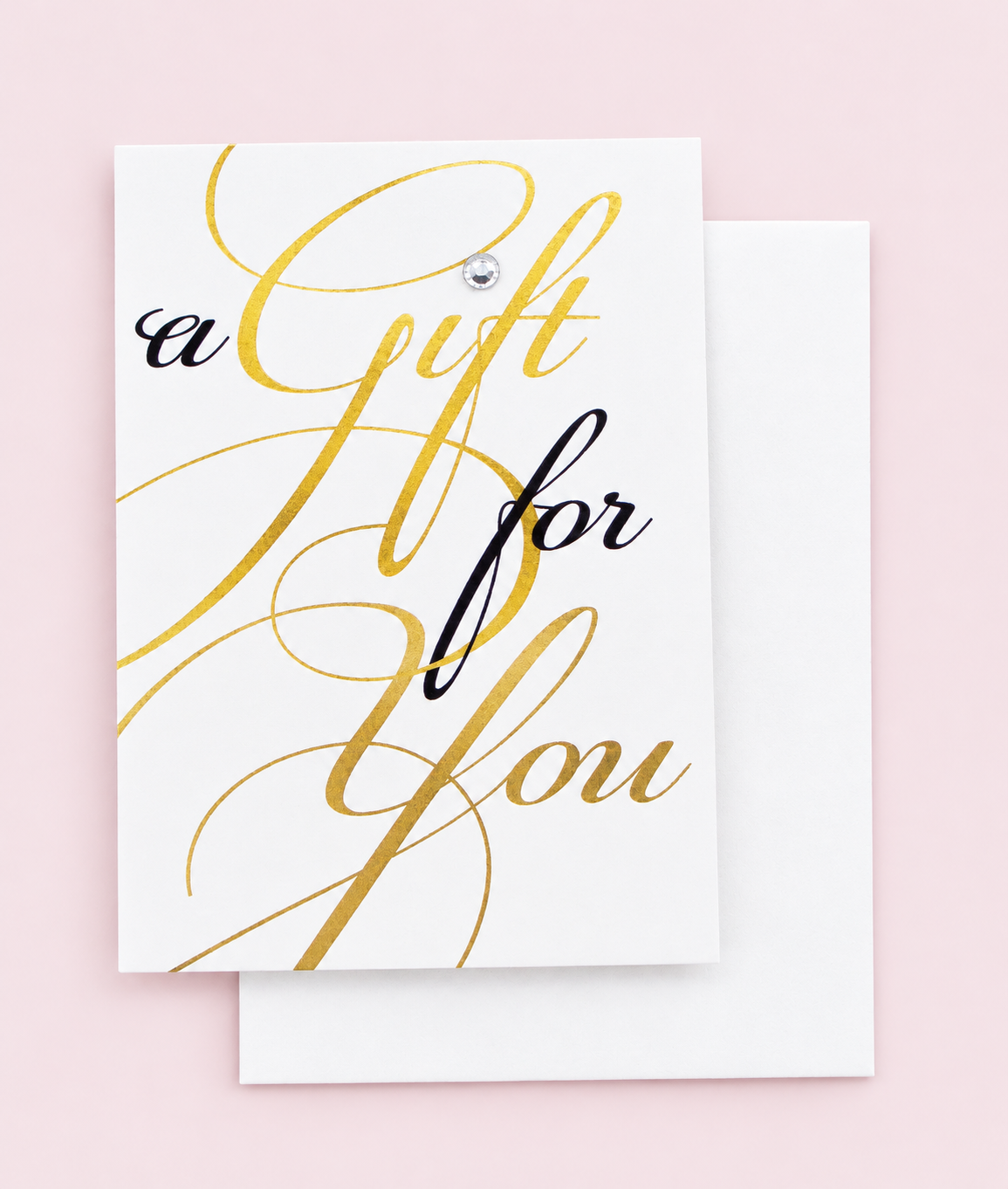 A Gift For You Greeting Card Mini Size with white envelope on a pale pink background