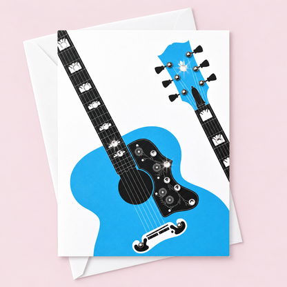 Blue Guitar Greeting Card with white envelope on a pale pink background