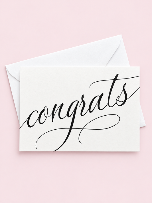 Congrats with a white envelope on a pale pink background