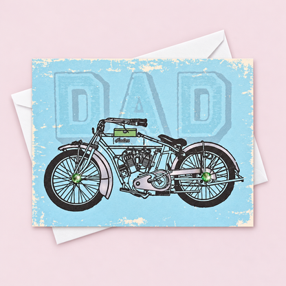 Father’s Day Motorcycle Card – Vintage Bike Greeting Card for Dad | Retro Motorbike Gift | Handmade Card for Motorcycle Lovers with white envelope on a pale pink background