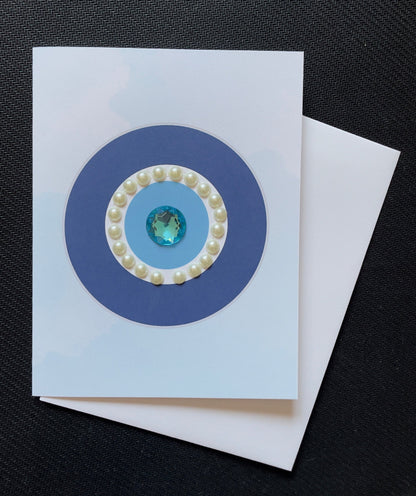 Minimalist evil eye protection greeting card with pearls and hand-applied sparkling details