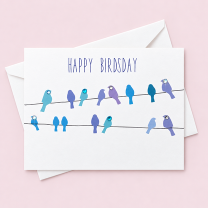 Happy Birdsday! Greeting Card with white envelope on a pale pink background