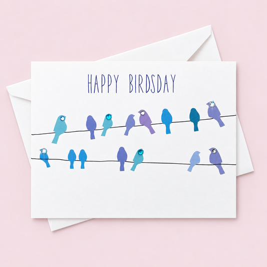 Happy Birdsday! Greeting Card with white envelope on a pale pink background