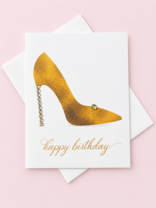Happy Birthday shoe greeting card with its original design, shown with a white envelope on a pale pink background