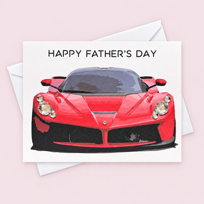 Happy Father’s Day Card – Red Sports Car Greeting Card for Dad | Handmade Card with Rhinestone Accents with a white envelope on a pale pink background