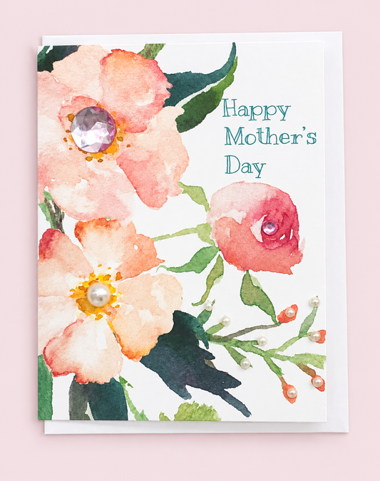 Happy Mother's Day Peach Floral Greeting Card with white envelope on a pale pink background