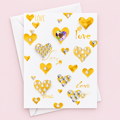 Gold Hearts and Love Greeting Card greeting card with its original design, shown with a white envelope on a pale pink background