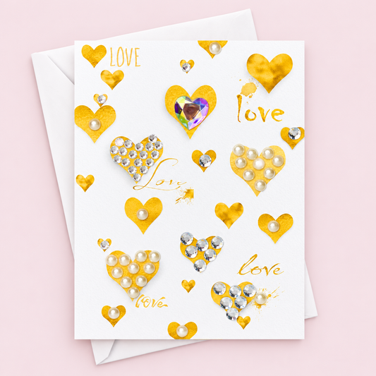 Gold Hearts and Love Greeting Card greeting card with its original design, shown with a white envelope on a pale pink background