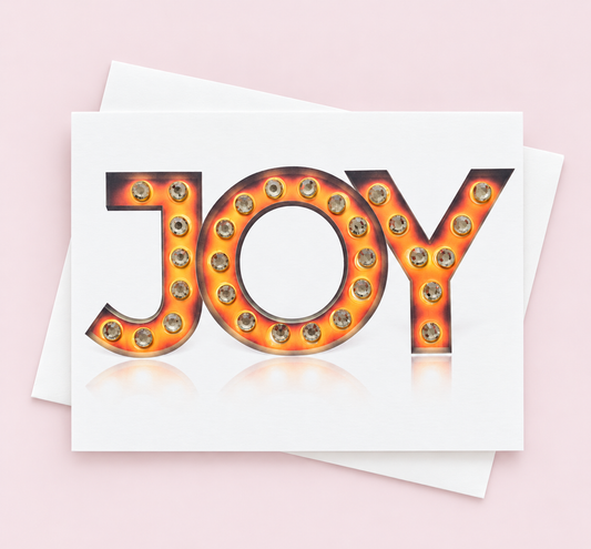 Joy in Lights! Greeting Card greeting card with its original design, shown with a white envelope on a pale pink background