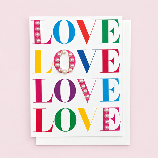 Multicoloured Love Love Love Love with a white envelope on a pale pink background