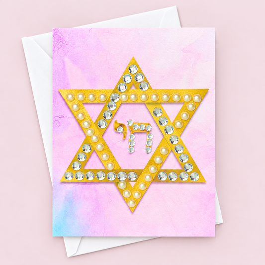 Magen David | Star of David Greeting Card - Pearl greeting card with its original design, shown with a white envelope on a pale pink background