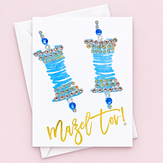 Mazel Tov Bar/Bat Mitzvah - Blue and Gold Torah Scroll greeting card with its original design, shown with a white envelope on a pale pink background