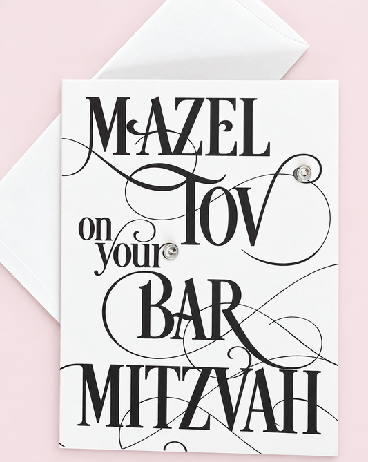 Mazel Tov on Your Bar Mitzvah Black Script greeting card with its original design, shown with a white envelope on a pale pink background