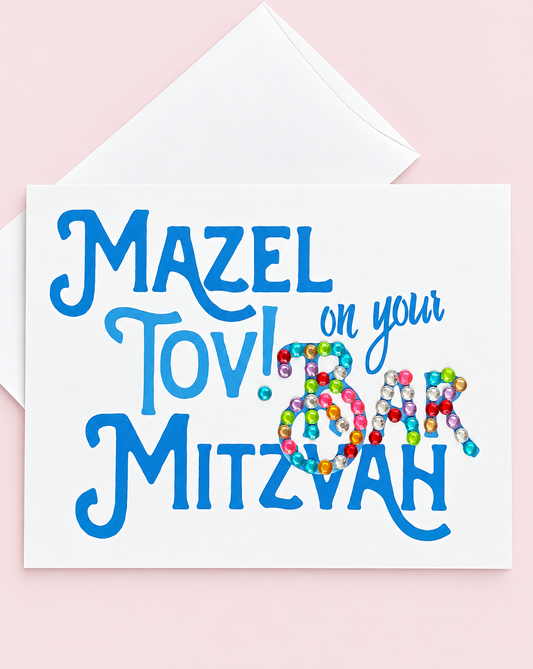 Mazel Tov on your Bar Mitzvah Blue greeting card with its original design, shown with a white envelope on a pale pink background