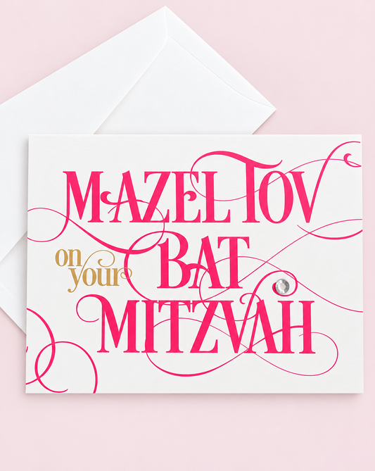 Mazel Tov on your Bat Mitzvah Hot Pink Script greeting card with its original design, shown with a white envelope on a pale pink background