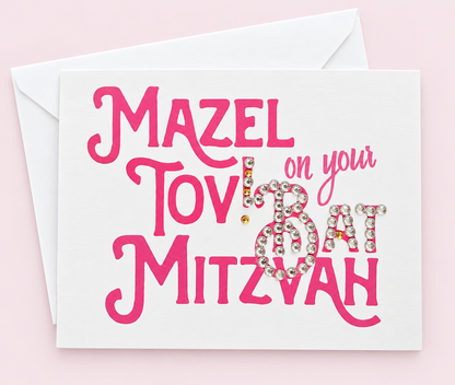 Mazel Tov on your Bat Mitzvah Pink greeting card with its original design, shown with a white envelope on a pale pink background