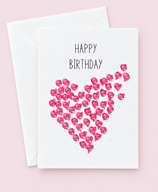 Mini Happy Birthday Day Fly Away Hearts Pink greeting card with its original design, shown with a white envelope on a pale pink background