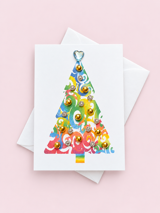 Mini Holiday Tree Greeting Card greeting card with its original design, shown with a white envelope on a pale pink background