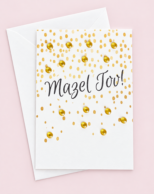 Mini Mazal Tov greeting card with its original design, shown with a white envelope on a pale pink background