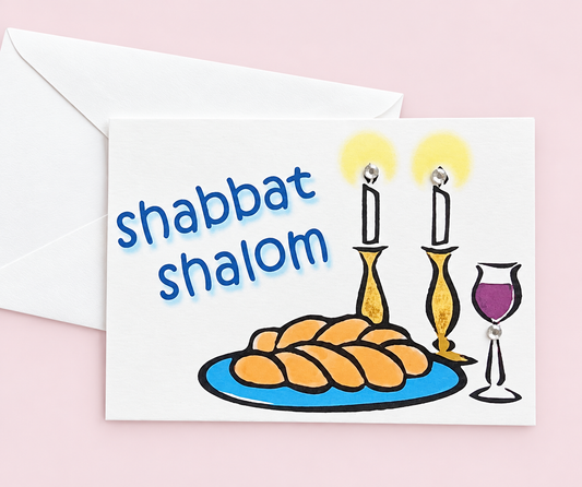 Mini Shabbat Shalom greeting card with its original design, shown with a white envelope on a pale pink background