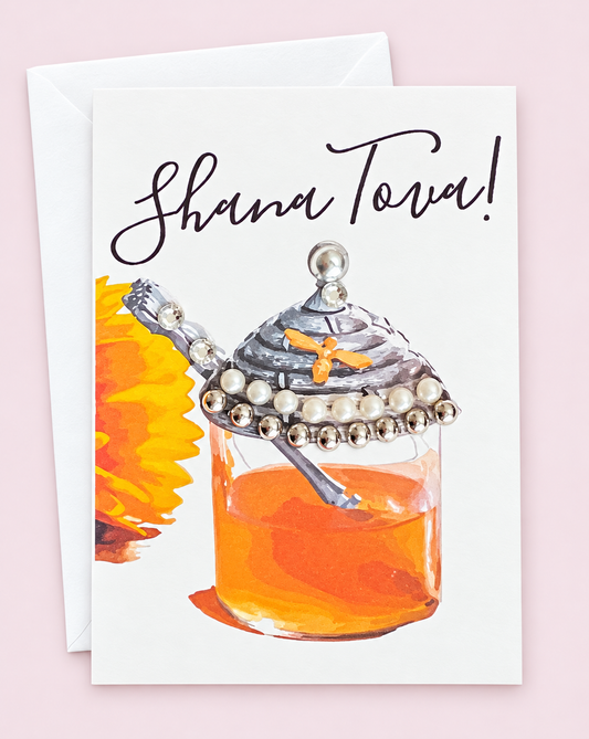 Mini Shana Tova Honey Pot greeting card with its original design, shown with a white envelope on a pale pink background