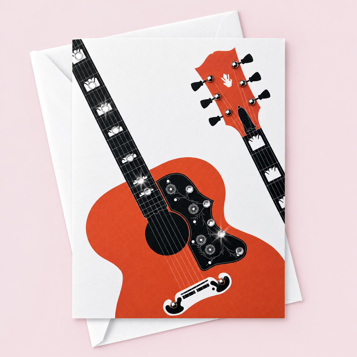 Orange Guitar Greeting Card with white envelope on a pale pink background
