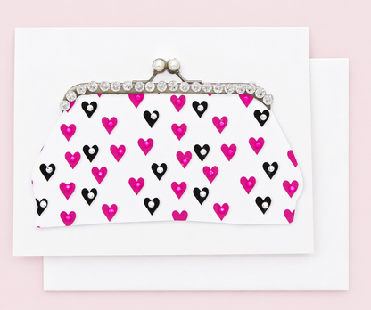 Pink Heart Purse Greeting Card with white envelope on a pale pink background