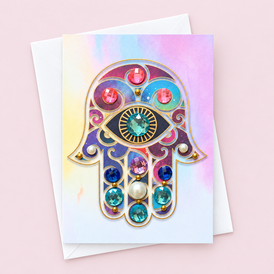 Purple Hamsa Watercolour Greeting Card greeting card with its original design, shown with a white envelope on a pale pink background