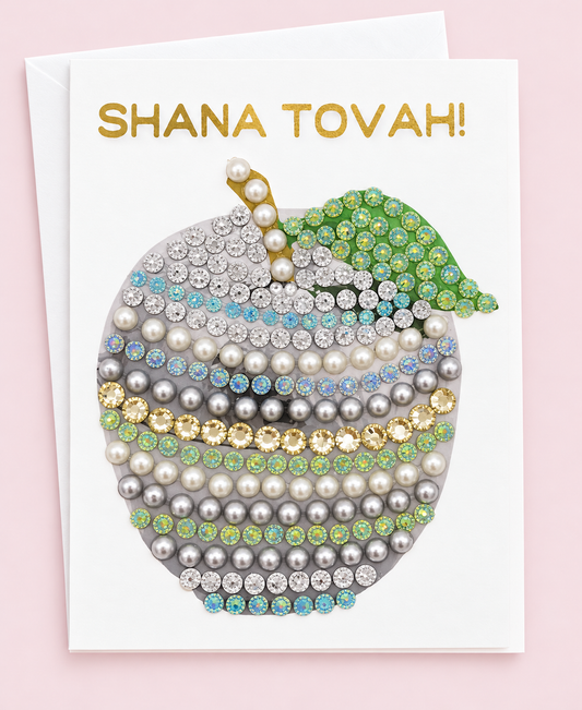 Shana Tova!  Sparkly Apple Greeting Card with white envelope on a pale pink background