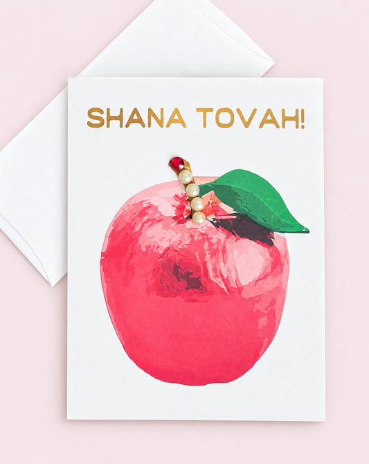 Shana Tovah! Rosh Hashanah Red Apple Card greeting card with its original design, shown with a white envelope on a pale pink background