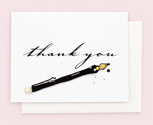 Thank You Black Pen Greeting Card with white envelope on a pale pink background