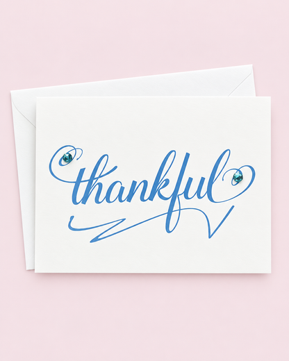 Thanksgiving Greeting Cards - Blue Thankful with white envelope on a pale pink background