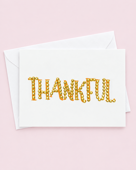 Thanksgiving Greeting Cards - Thankful Gold with white envelope on a pale pink background
