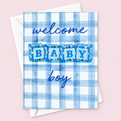 Welcome Baby Boy with a white envelope on a pale pink background