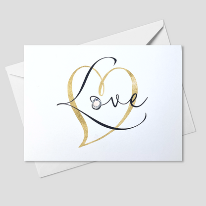 Script Love greeting card with gold heart and hand-applied sparkling details