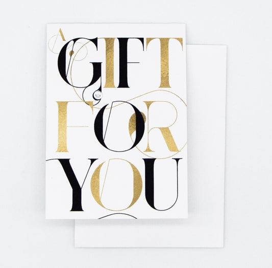 black and gold capital text with a message saying a gift for your